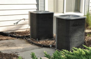 two older air conditioner units