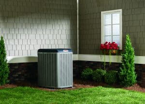 Lennox air conditioning unit in backyard