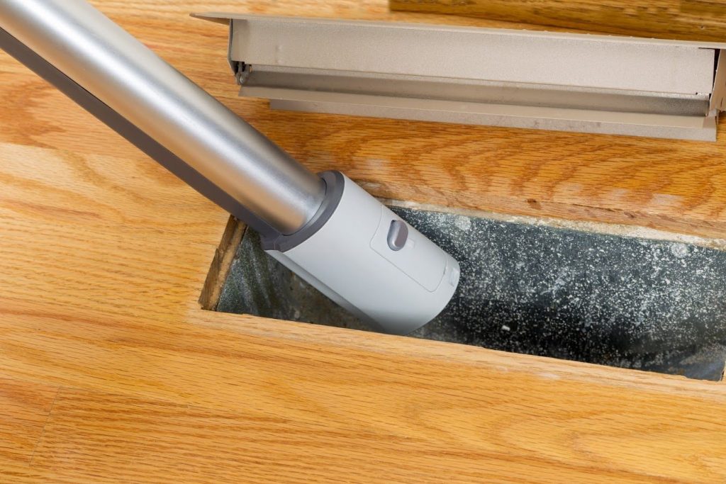 vacuuming heating and air conditioning vent