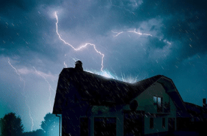 lightning storm above residential home