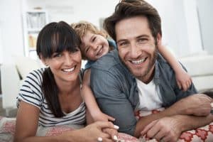 family in comfortable heated home