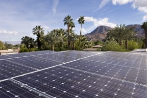 solar panel installation with mountains in the horizon