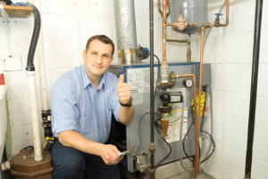 hvac technician evaluating a furnace