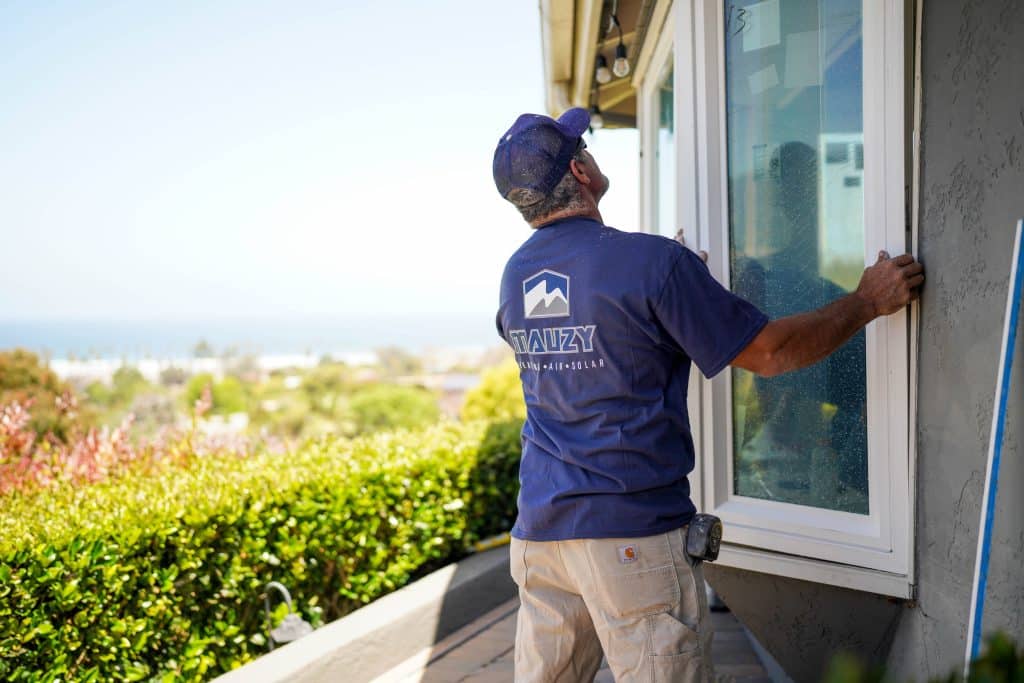 Mauzy experts installing windows on home